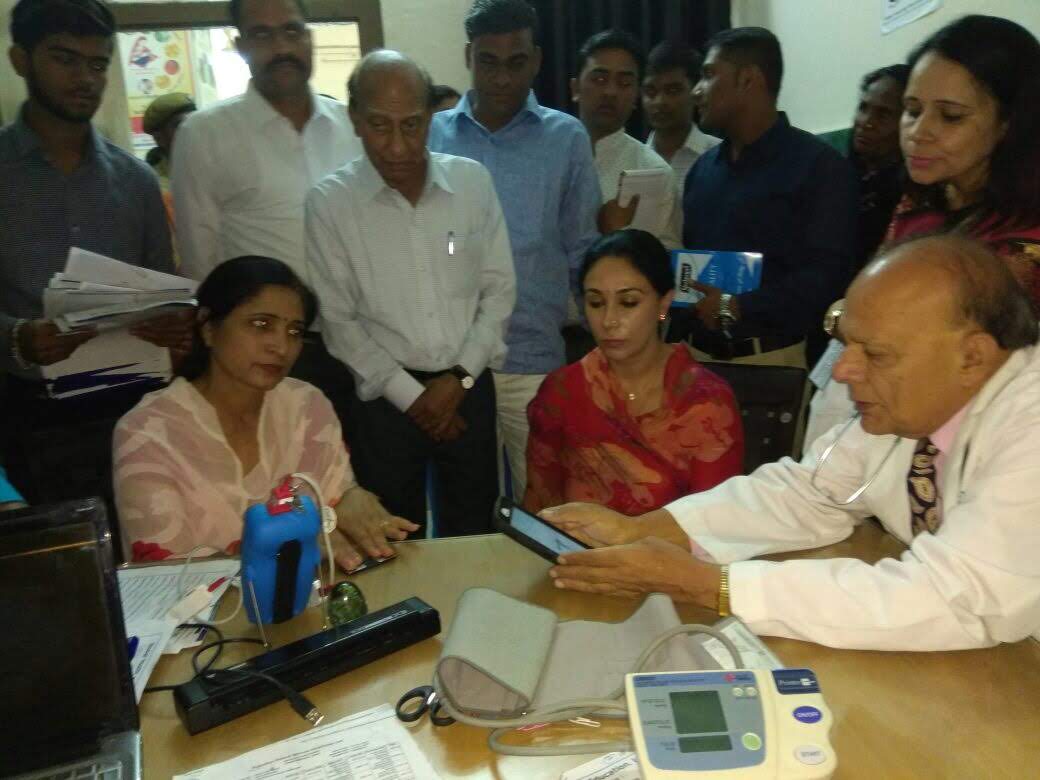 Blood Pressure Check of a Patient at Free Heallth Screening Camp at Khandar, India